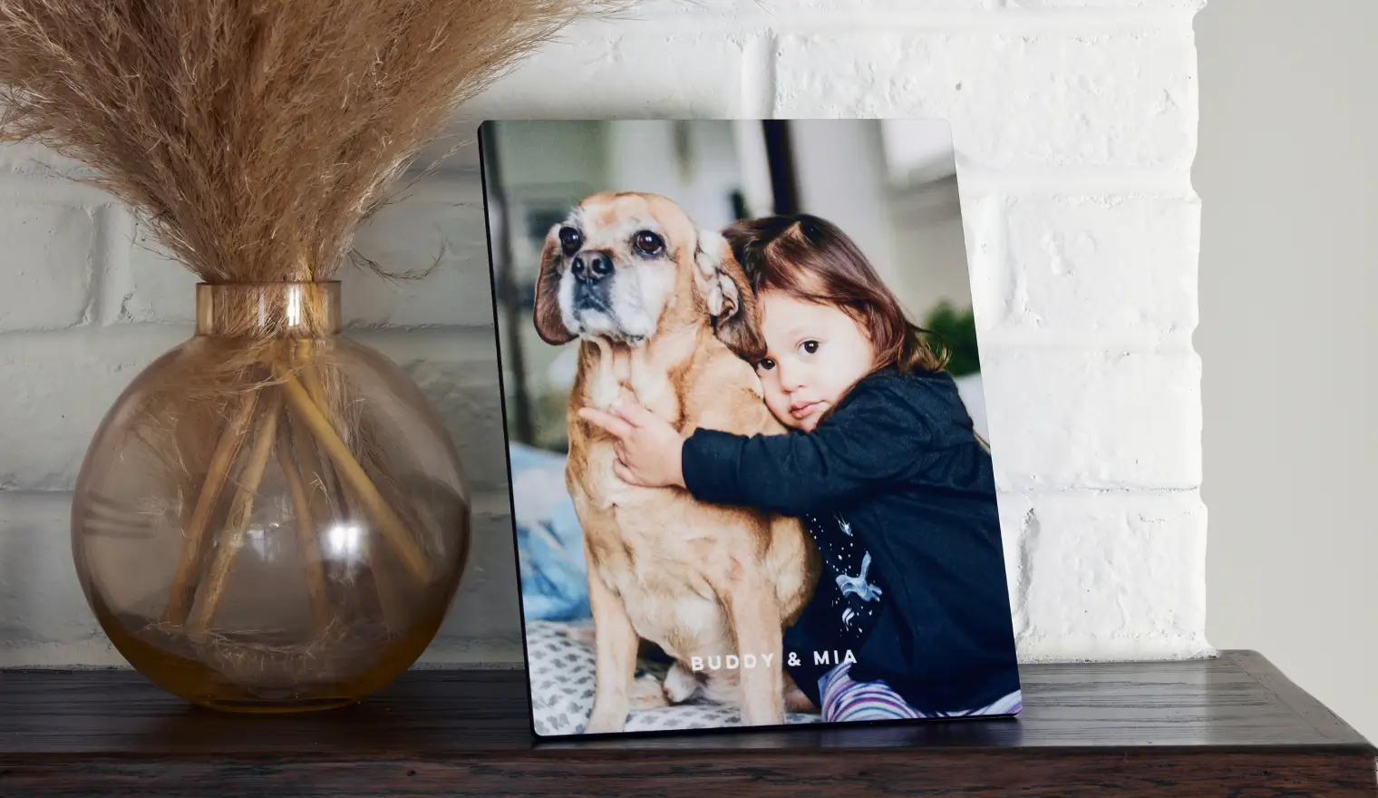 Personalized canvas prints prints on table.