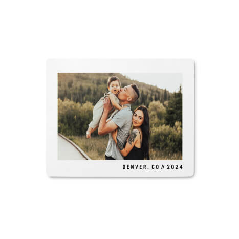 Photo magnet of family.