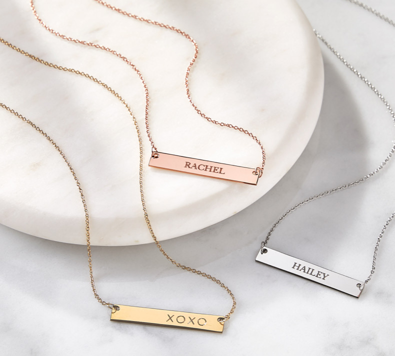 Engraved jewelry with names are thoughtful gifts for her.