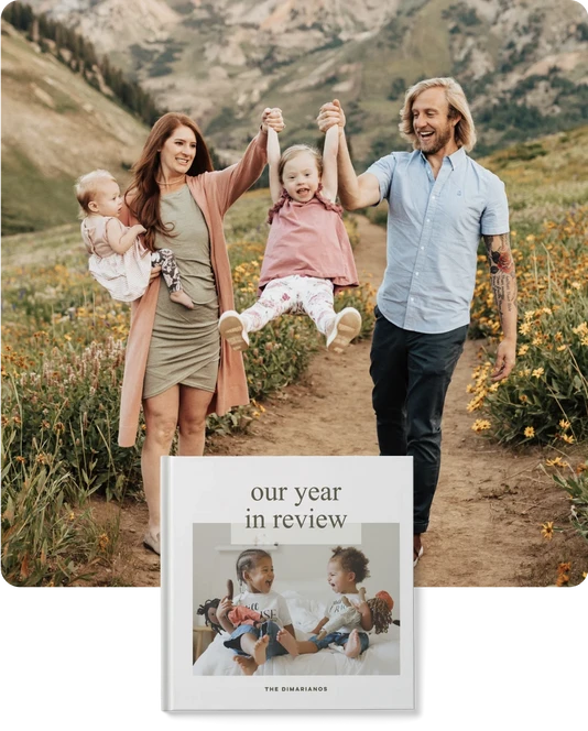 Family photo on a mountain and year in review photo book.