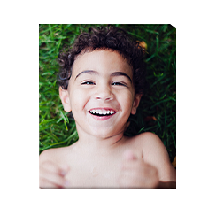 Photo gallery portrait wall art with smiling boy