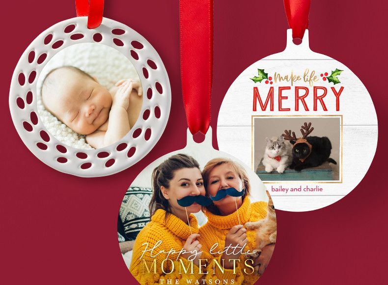 Three personalized Chistmas ornaments with pictures of a baby, cats, and a mother and daughter on each ornament