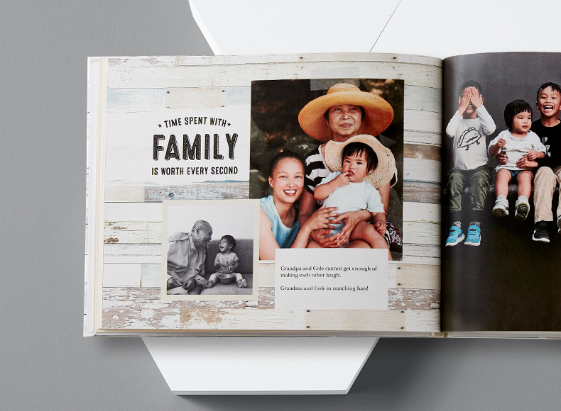 A family photo boook with a collage of family pictures and custom text on the pages