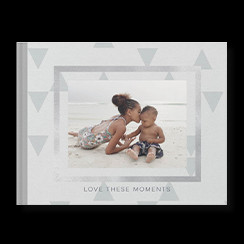 Simply Gray custom photo book style with a picture of two kids at the beach on the cover