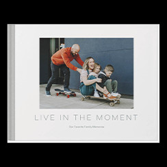 Simply Modern custom photo book style with a picture of a family on the cover