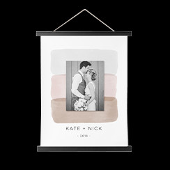 Hanging canvas print featuring watercolor design and black and white wedding photo