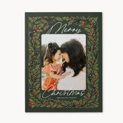 Holiday card with 'Merry Christmas' and family photo, great for sending warm seasonal greetings.