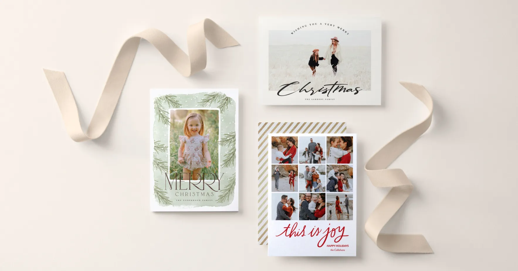 Three Holiday photo cards with festive designs, ribbons, and holiday greetings displayed on a light background.