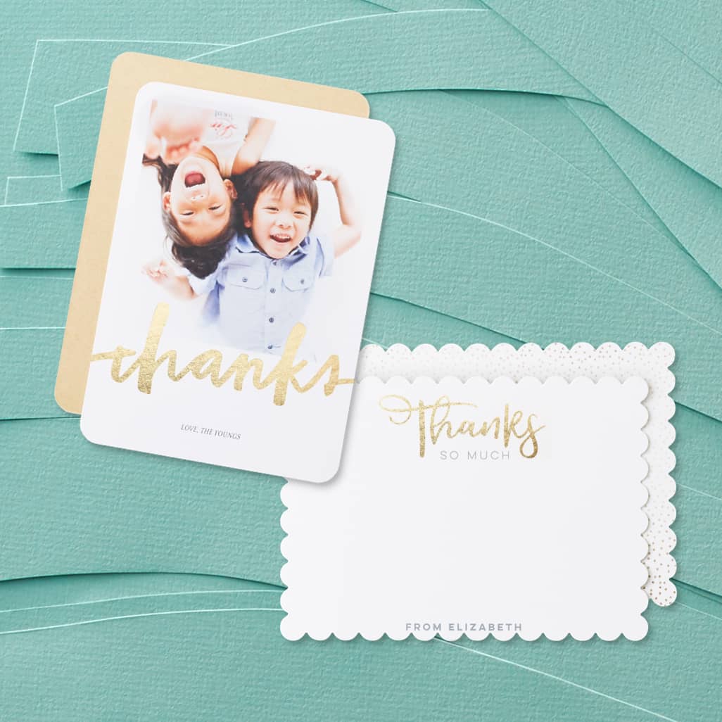 Two custom thank you cards with gold lettering